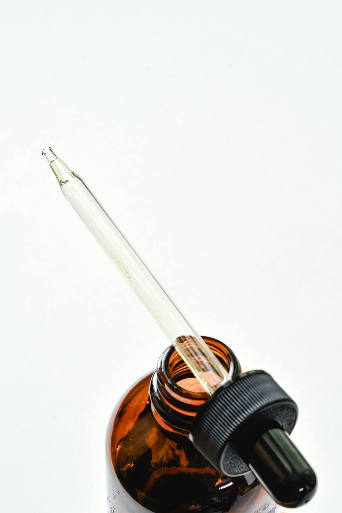 Rustic Strength, image of amber bottle with pipette on top