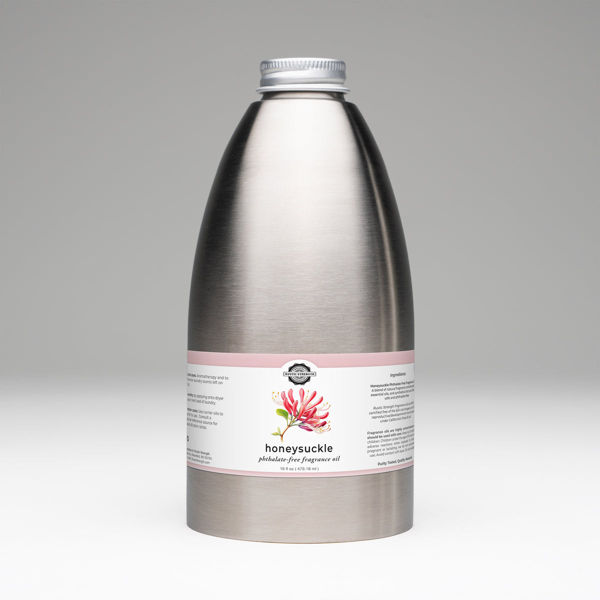 16oz bottle of Rustic Strength honeysuckle fragrance oil