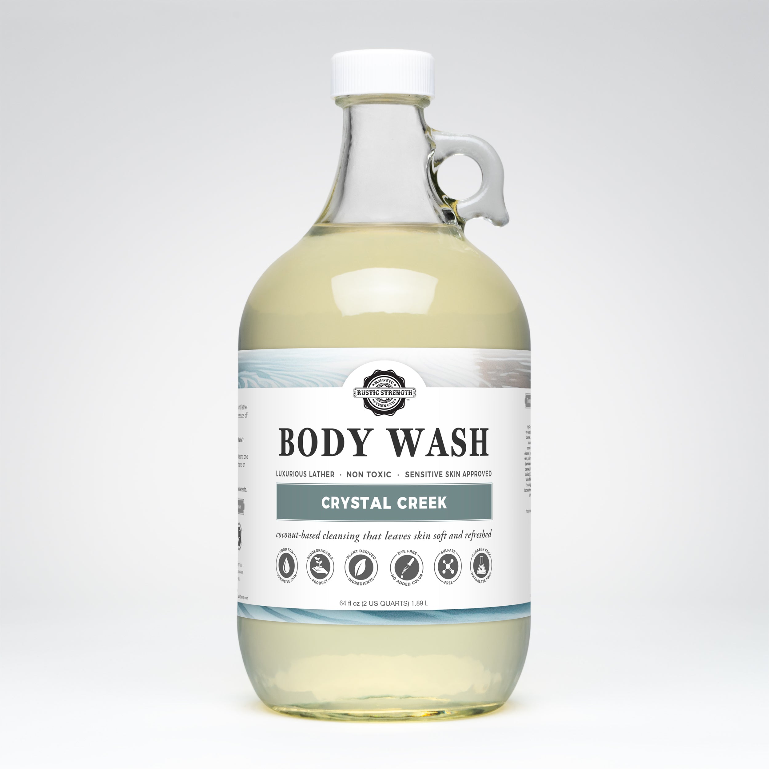 half gallon glass Bottle of Crystal Creek body wash on a white background