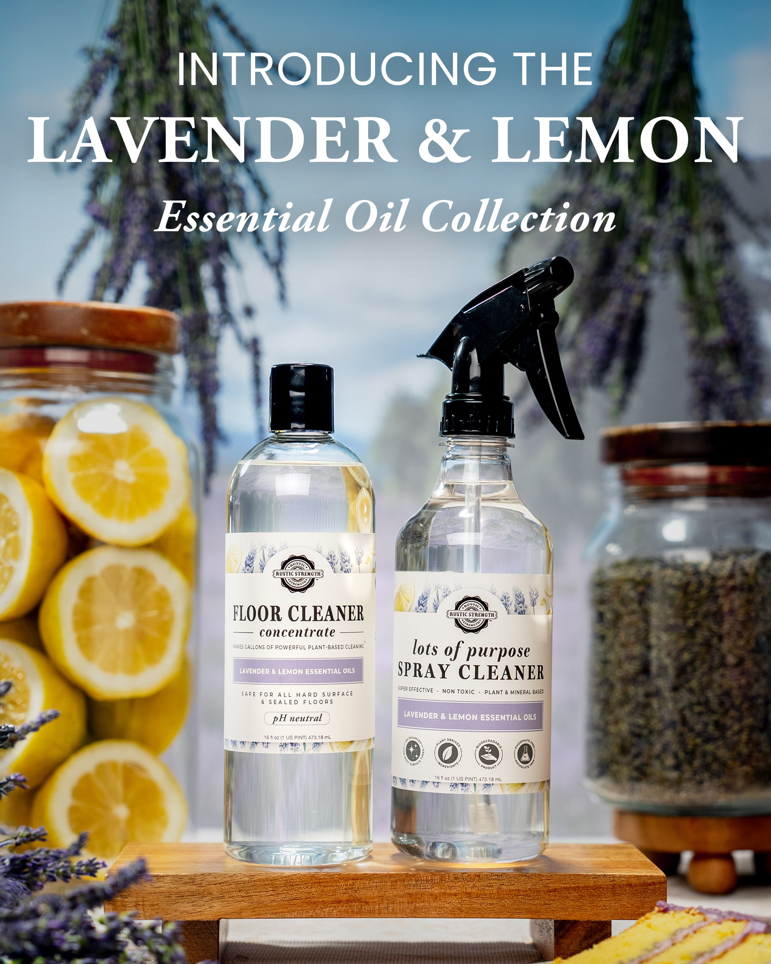 Lavender and lemon essential oil products on a wooden surface with lavender and lemon slices in the background.