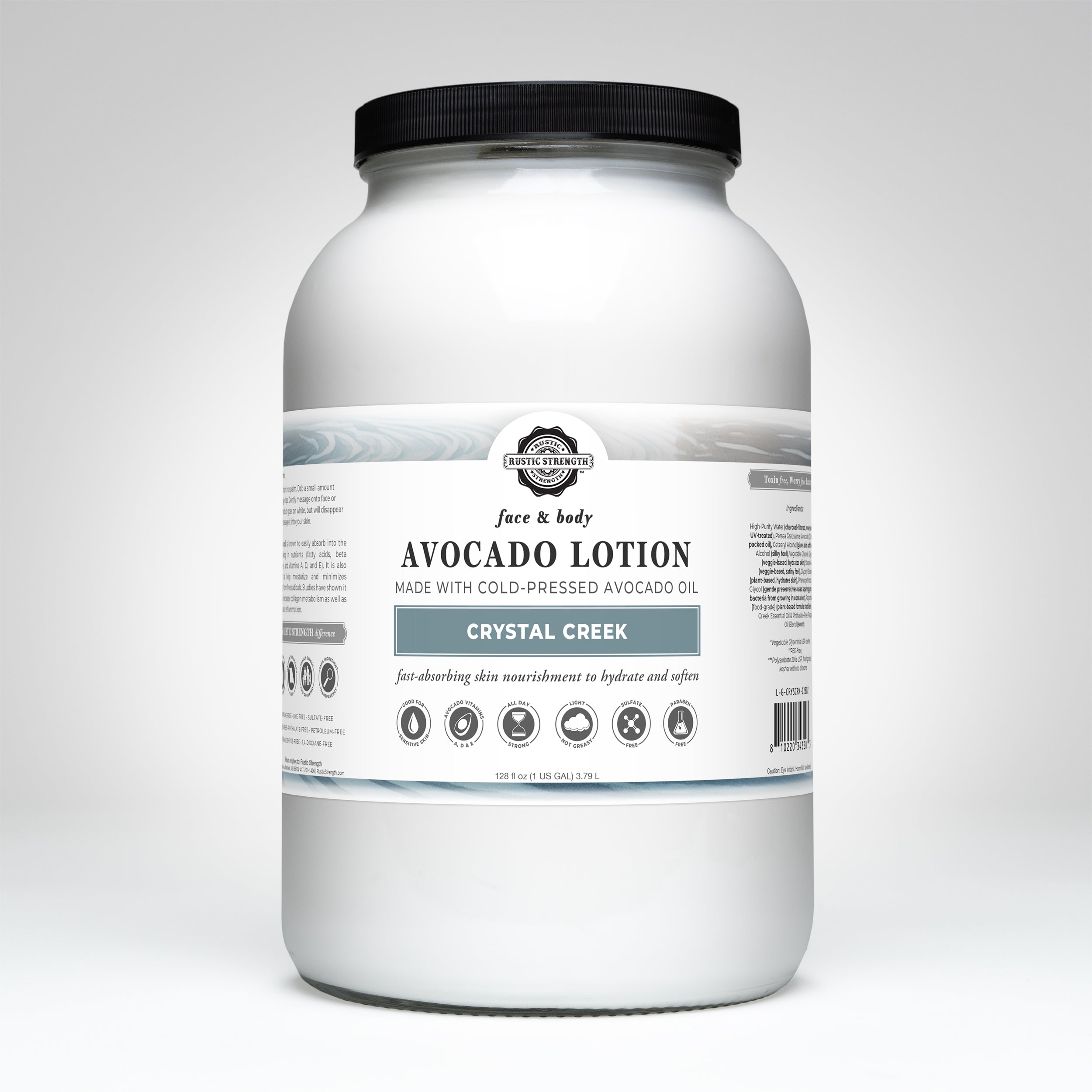 Gallon glass Crystal Creek scented Avocado lotion container with label on a white background