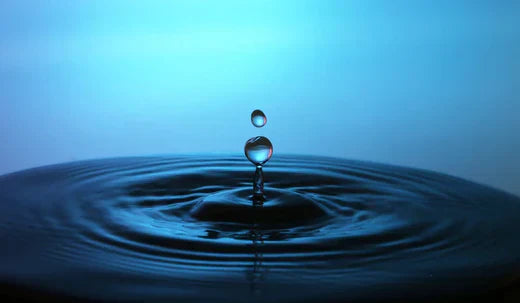 What is Charcoal Filtered Deionized Water and what does it do in products?