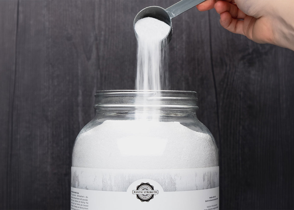 Rustic Strength - White powder being poured from a scoop into a Rustic Strength glass jar