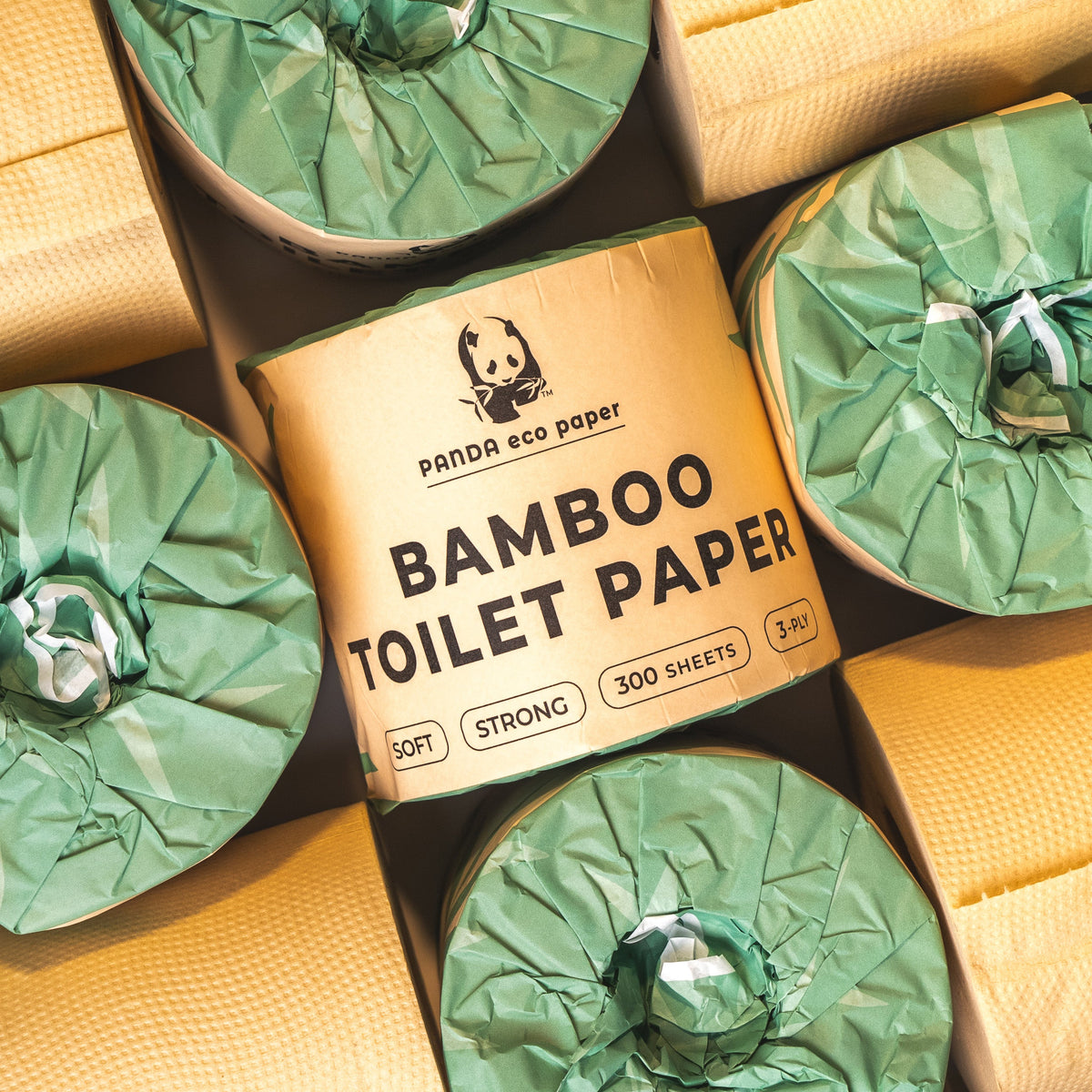 Panda Eco Paper, Rustic Strength, Bamboo Toilet Paper arranged in a pattern