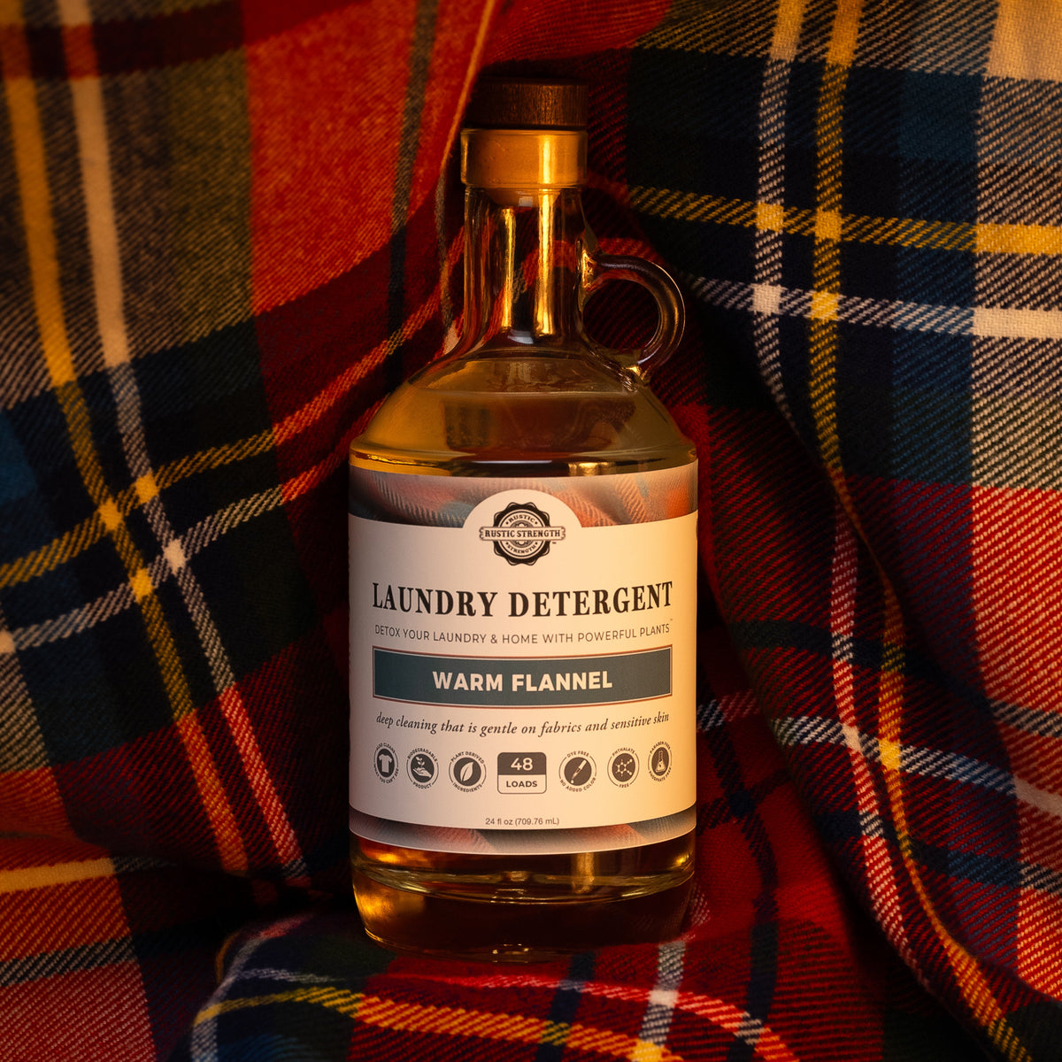 Rustic Strength - Laundry Detergent | 24oz Glass | Warm Flannel with a flannel backdrop