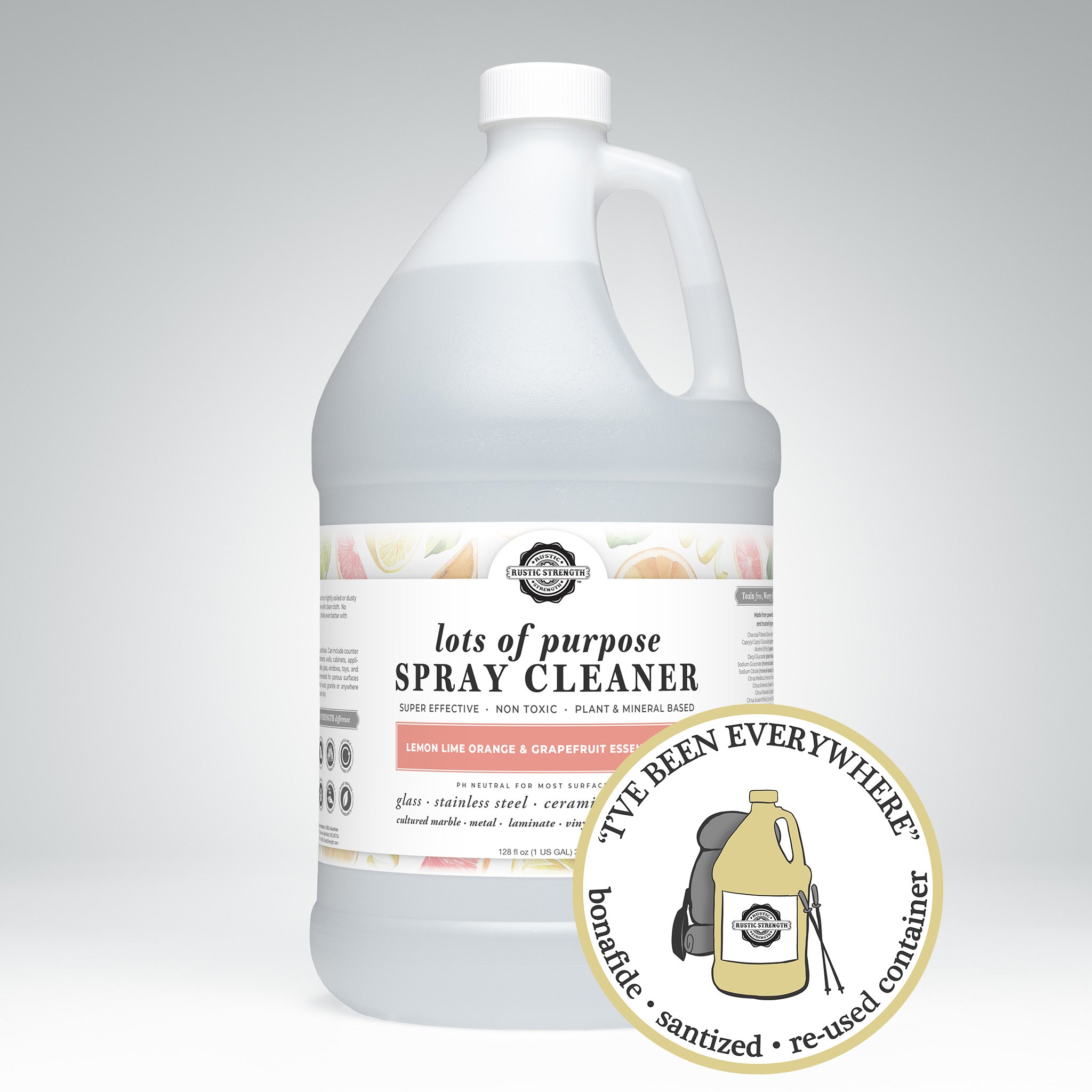 Sanitized and refilled gallon plastic jug of Lots Of Purpose Spray Cleaner in the scent Lemon Lime Orange and Grapefruit Essential Oils