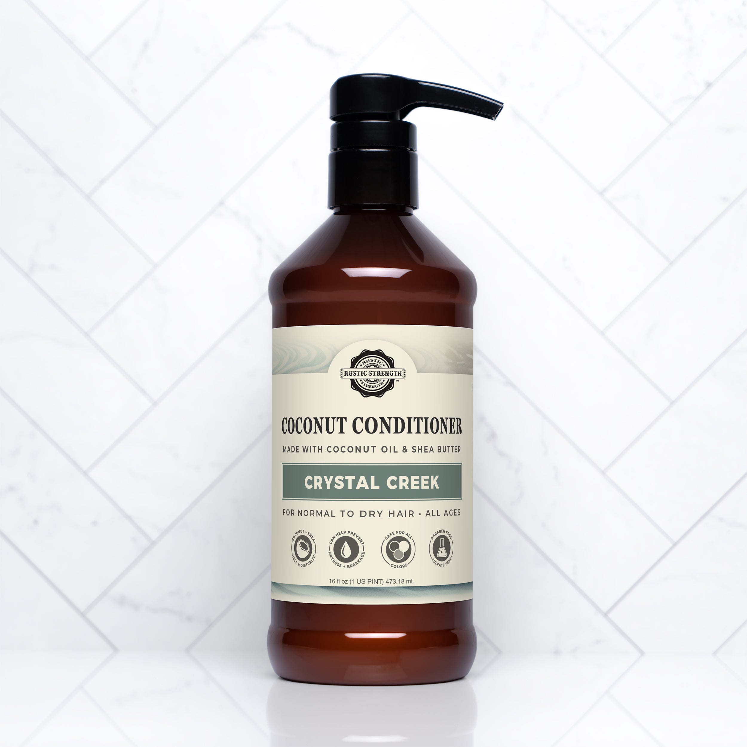 Crystal Creek scented Coconut conditioner bottle with pump on a white background
