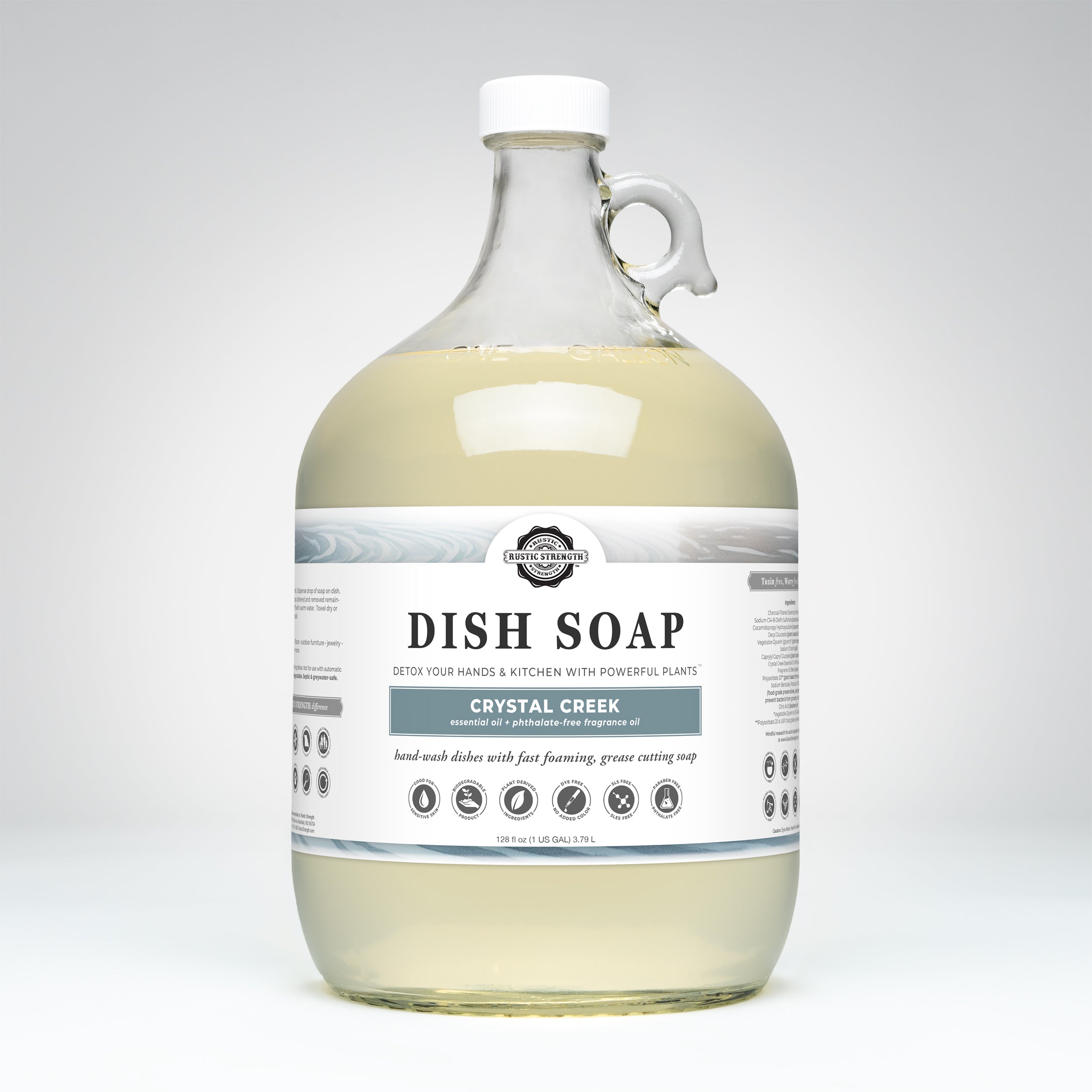 Crystal Creek scented gallon glass bottle of dish soap with a label on a white background