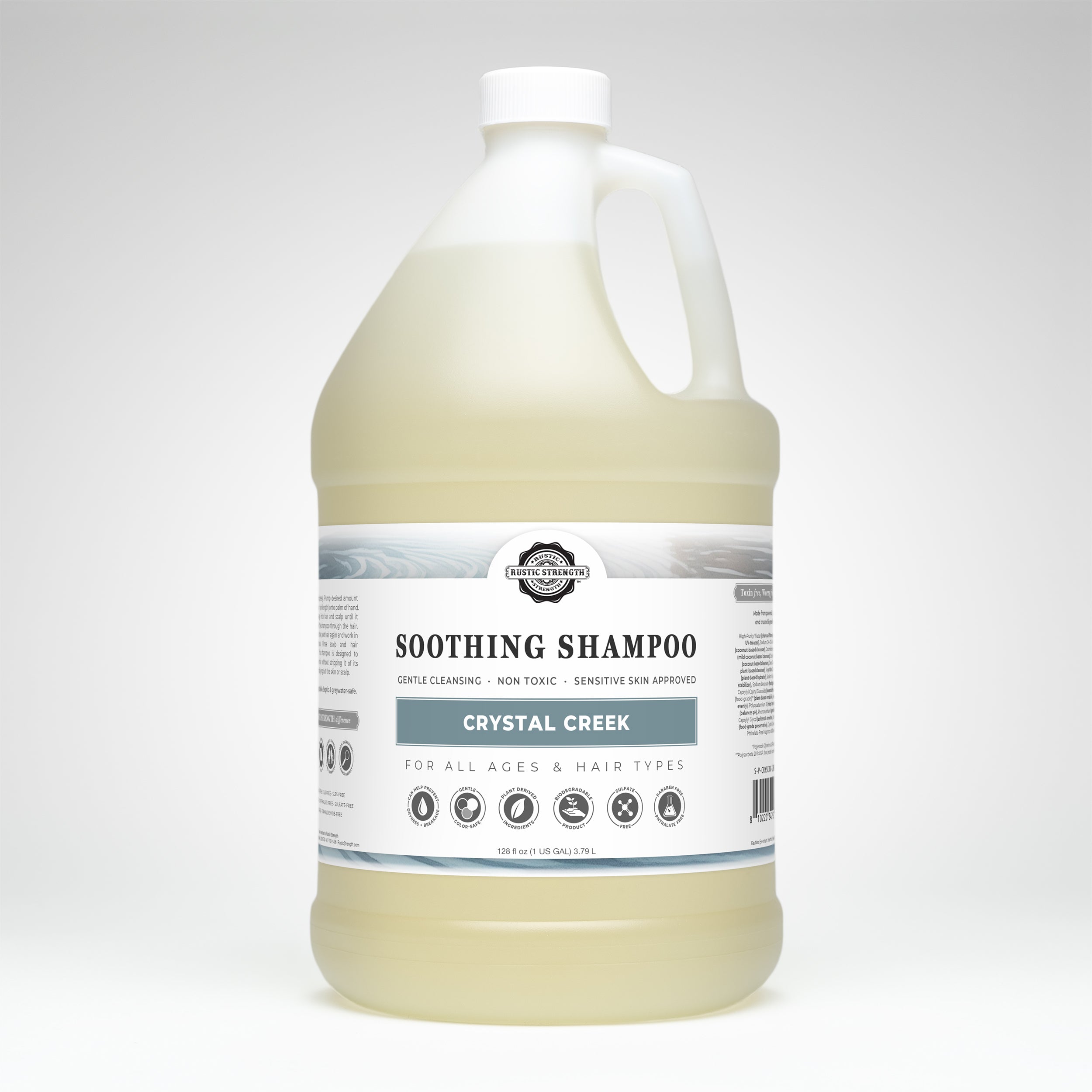 Gallon bottle of Crystal Creek Soothing Shampoo on a white background